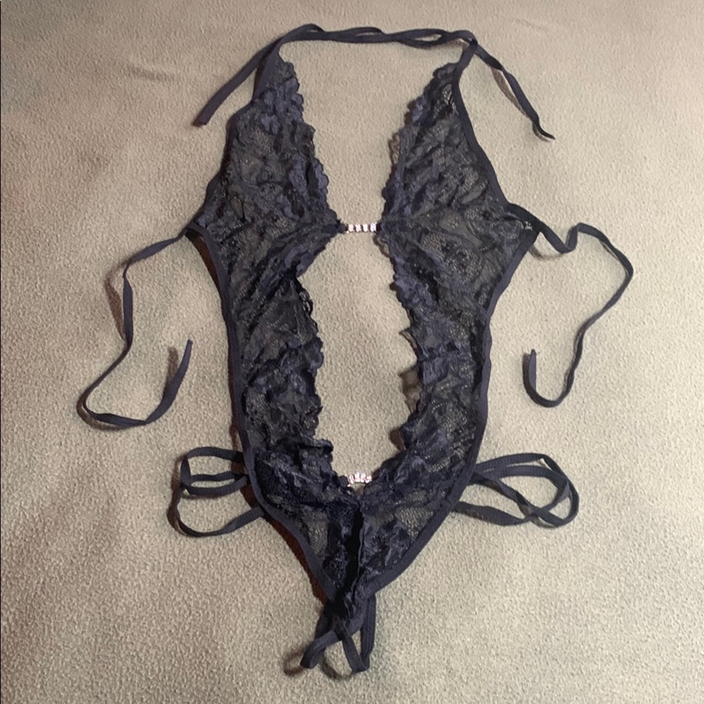 Sexy black lace, crotchless bodysuit. Never worn. See pictures for size.